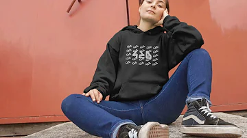 video of a woman sitting down with legs open wearing a pullover hoodie a13116