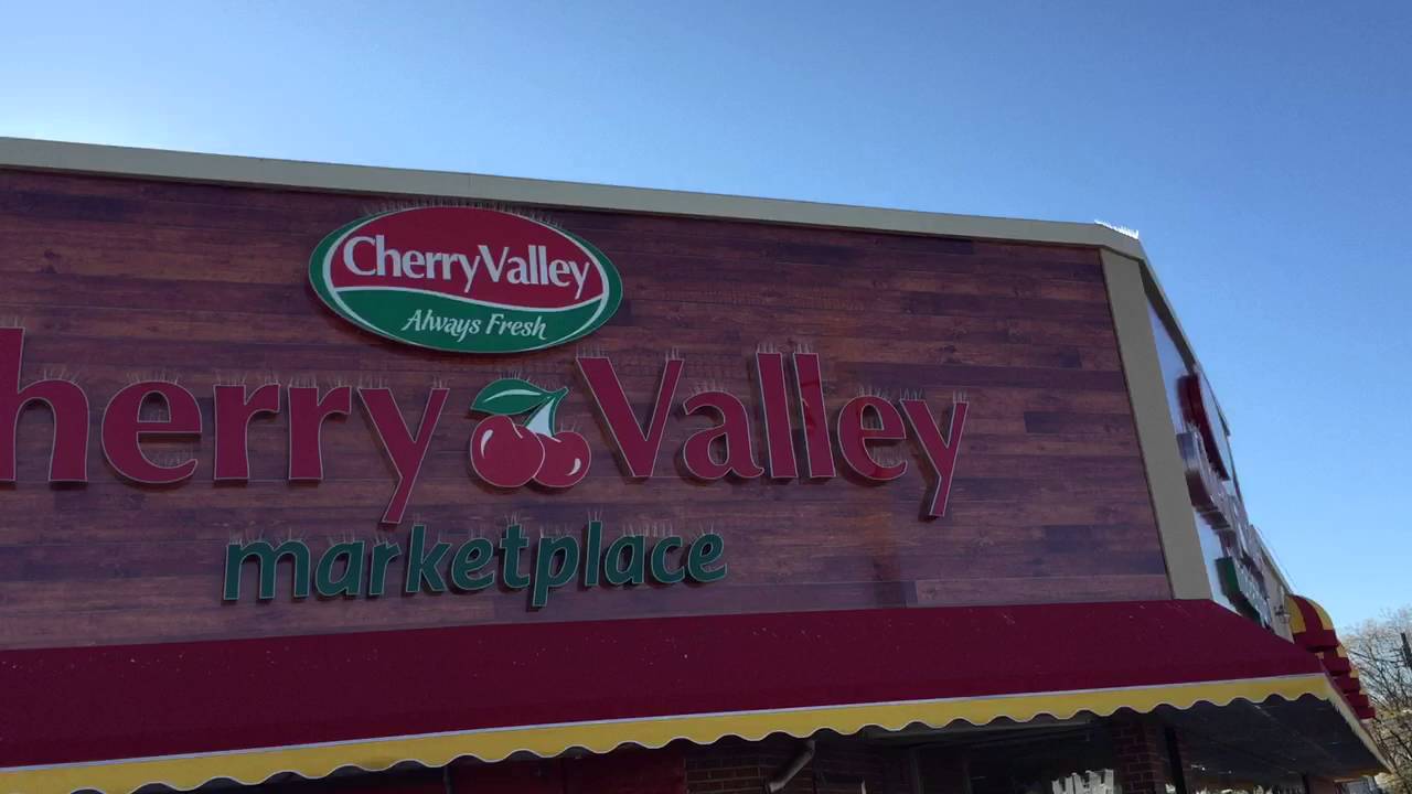 Cherry valley market place rockaway Blvd kenan sign awning faux stucco