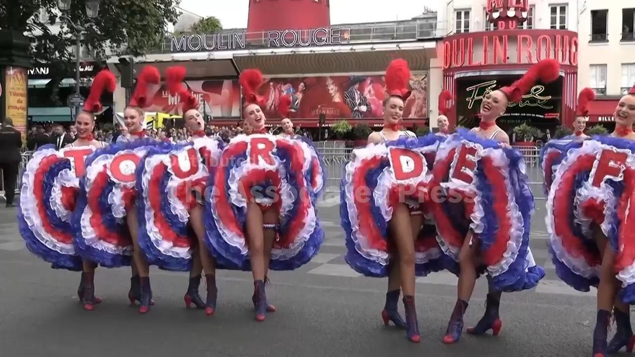 Moulin Rouge dancers perform cancan in Paris as the Tour De France comes to a close