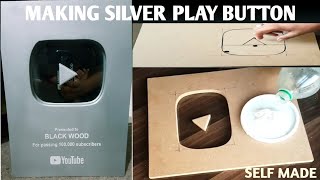 Make a wooden youtube silver play button.