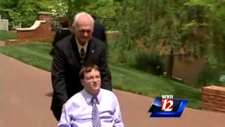 HPU Senior Receives Diploma with Aid of an Unlikely Friend