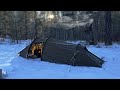 Hot tent winter camping in snow