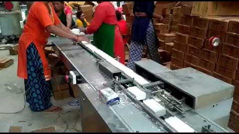 UGP7120 F HORIZONTAL FLOW WRAP MACHINE WITH MECHANICAL AUTO FEEDER