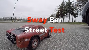 Traxxas Slash 4x4 Sway Bar Test - on 3S LiPo, slightly wet ground and trying to spin out