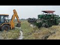 John Deere 5075E harvester stuck in mud rescued by cat jcb | Tractor videos| VSK Veeresh|