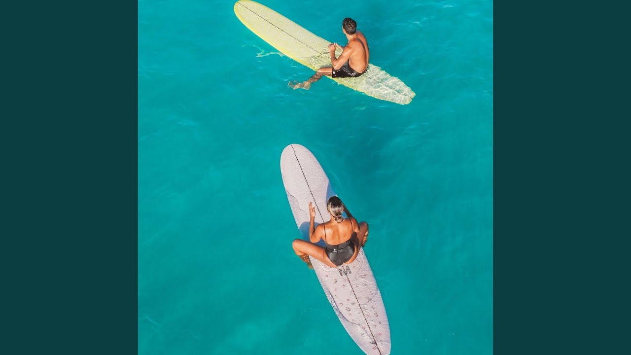 Surfers Paddling