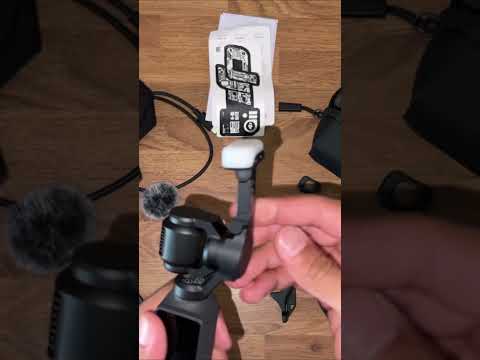 DJI Osmo Pocket 4 with Battery & Tripod