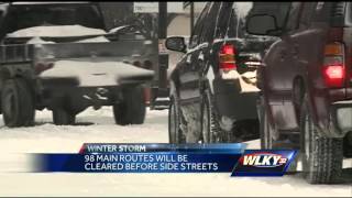 Snow crews work to clear Louisville streets