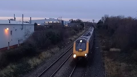 1V58 seen passing my position at oldends lane footbridge being formed up of 220018 and 220034.