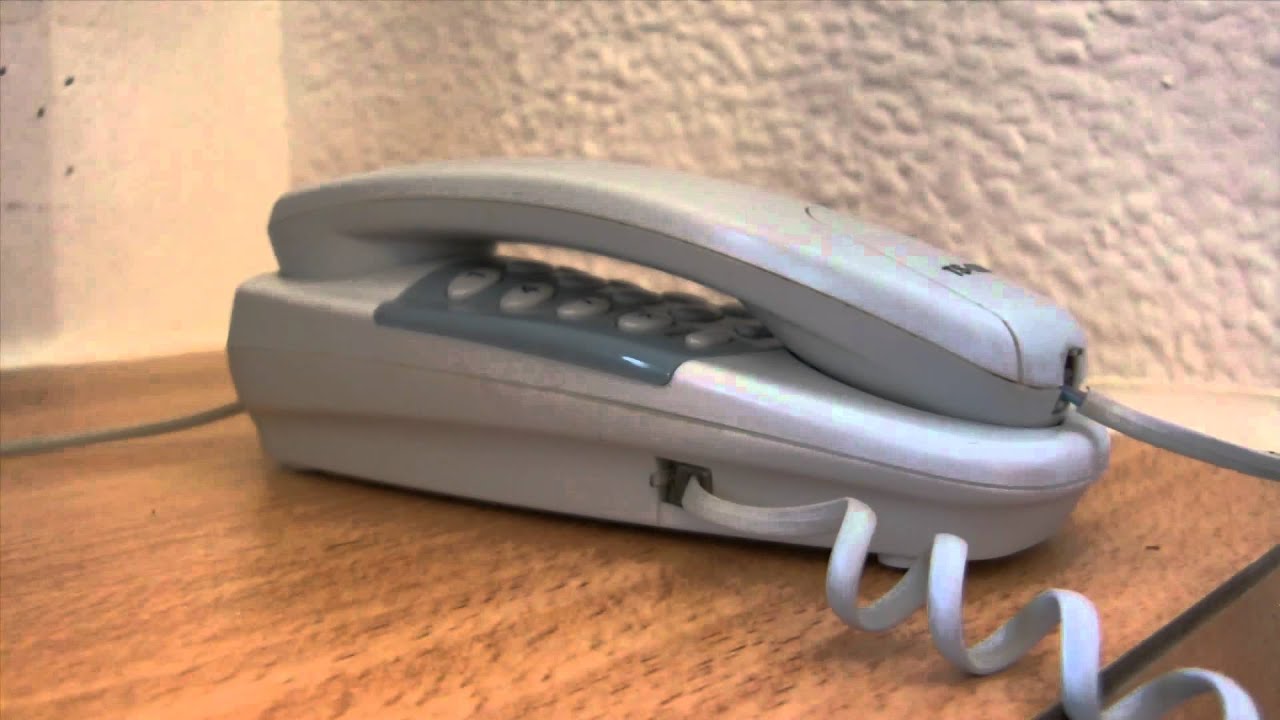 Picking up the Phone and Hanging Up Fast - Footage Tripod