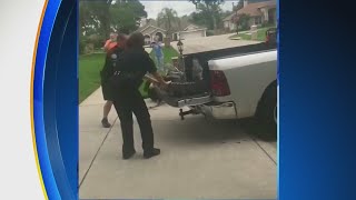 Trappers Have Difficult Time Loading Gator On Truck