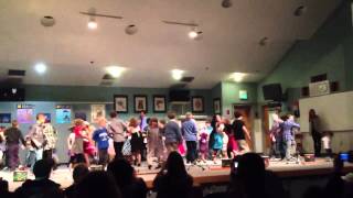 2nd graders square dancing