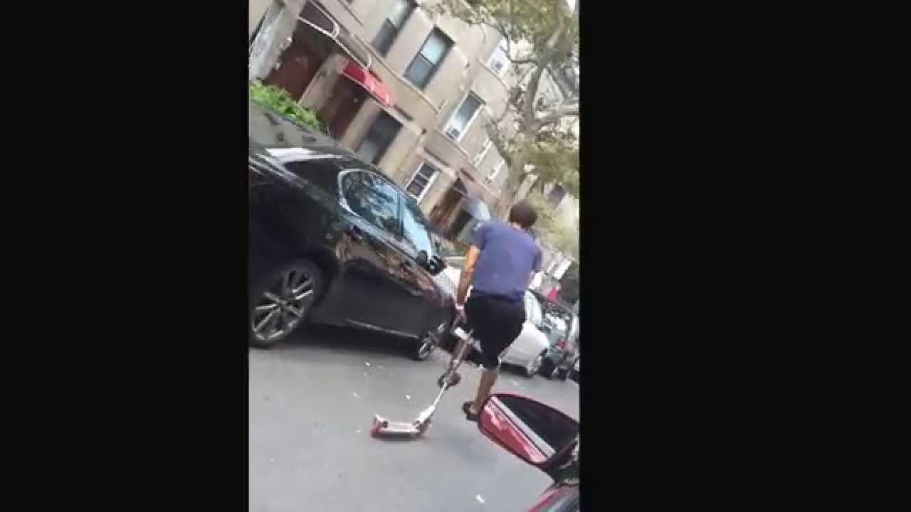 Riding on the handlebars of a razor kick scooter YouTube