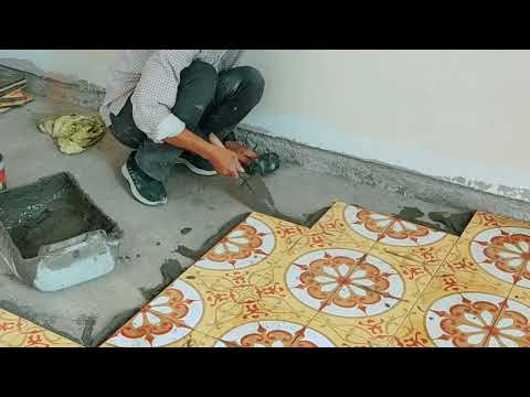 Cách mà người thợ lát gạch nền phòng khách gạch 20x20 hoa văn chuyền thống
