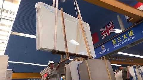 loading white marble slabs on truck