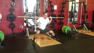 Barbell Lateral Slide in Squat Position