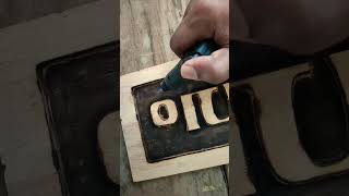 Crafting Elegance: Wood Finishing and Torch Detailing for a Beautiful House Name