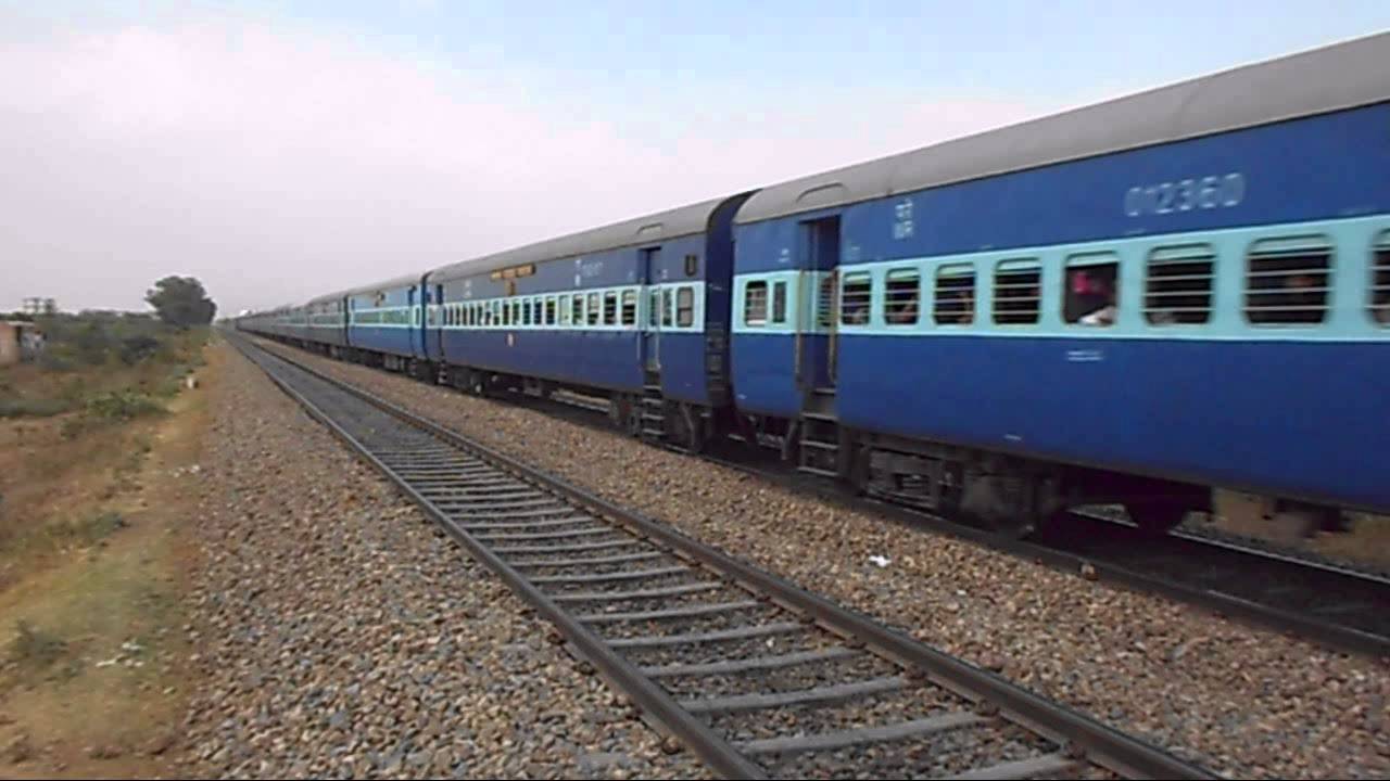 Crowded Indian Train Ashram express rooftop ride