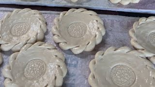 the process of making delicious bread baked in the oven in Uzbekistan