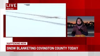 Snow blanketing Covington County Wednesday morning