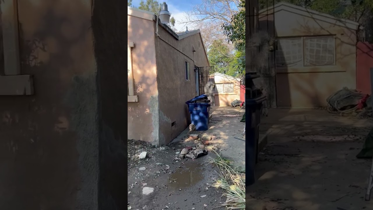 investment property for sale with a detached converted garage for additional rental income.