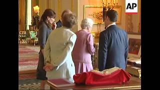 Queen Elizabeth conducts President Sarkozy on tour of Windsor Castle