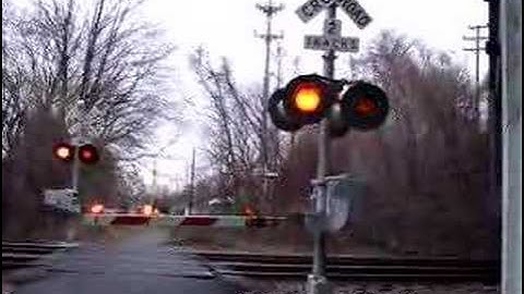 The NJ transit passes over the level crossing