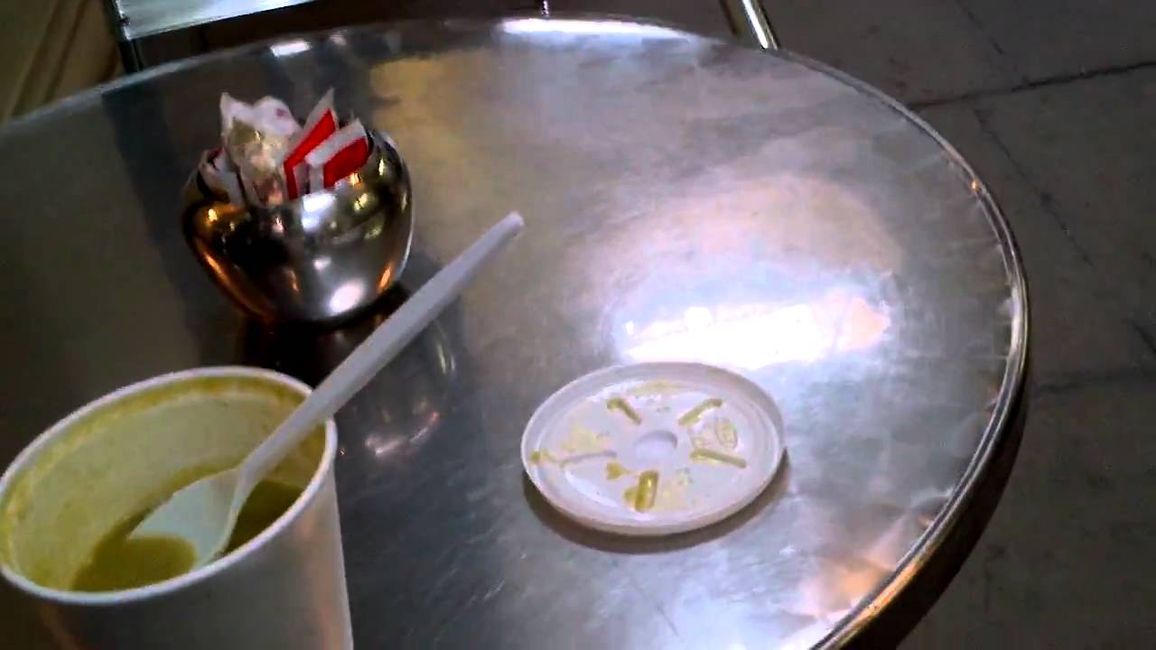 At the Royal Opera Arcade, London