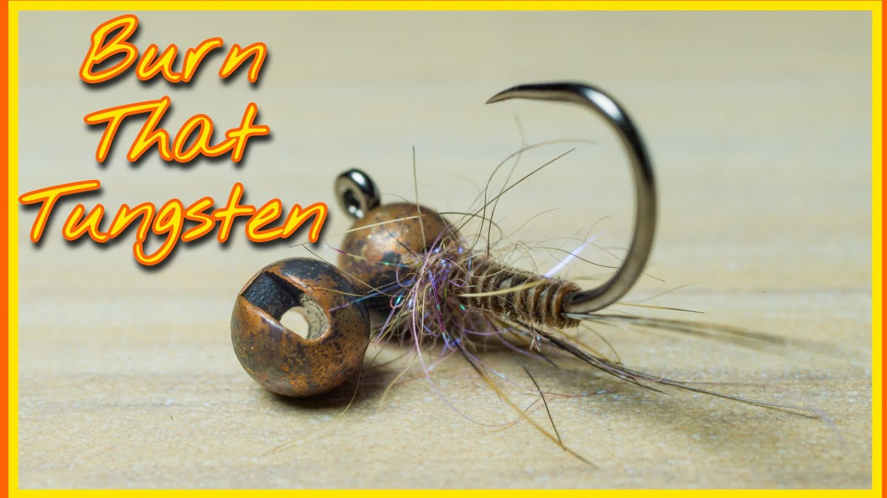 Burn that tungsten!!! Peacock Barb Nymph (Sinks almost like a perdigon)