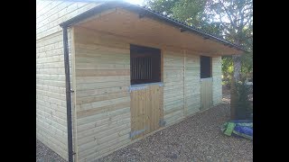 Building a wooden horse stables. Stable Build Company.