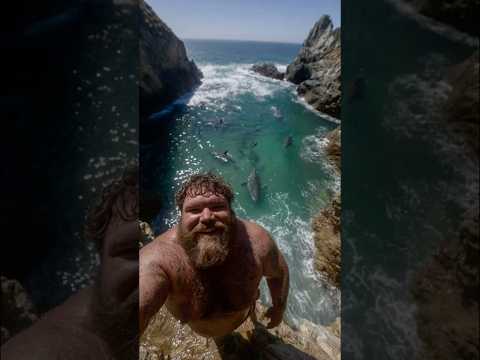 🌊🦈 Would you do it? Would you dive off the rocks… into shark-infested waters? #dive #shark