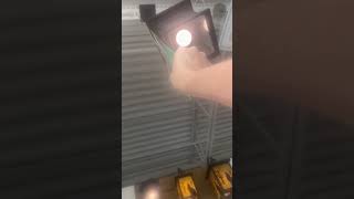 Pulling pull chains on lights at Menards