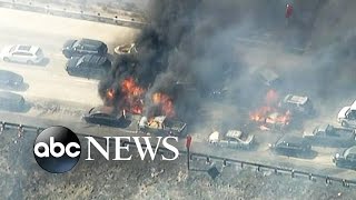 Trucks and cars in traffic go up flames as firefighters try to quell
the blaze. subscribe for latest news updates from abc ►
http://www.youtu...