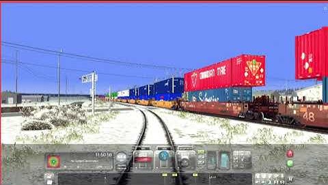 TS2021 BNSF ET44C4 Tier 4 GEVO Leads Stack Train With KCS ES44AC