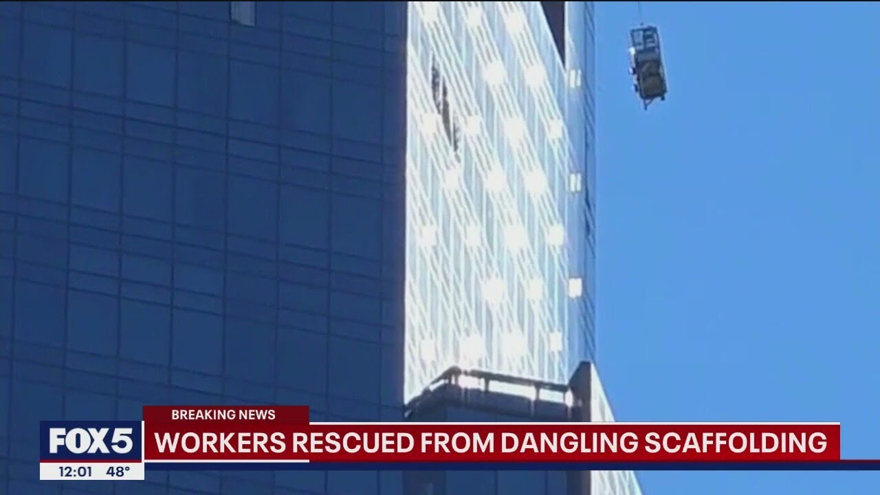 NYC window workers rescued from dangling scaffolding