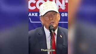 Dripping wet Trump HECKLED by protesters in Iowa