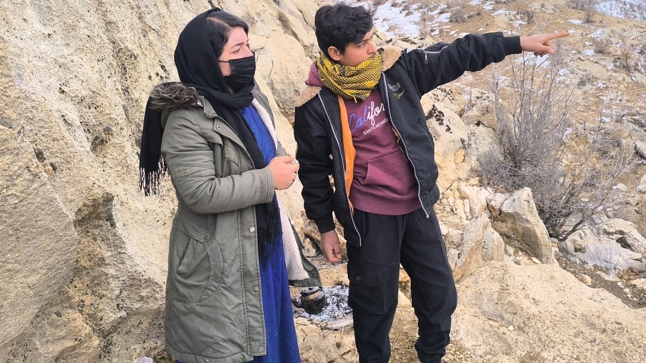 A young boy helping a homeless mother