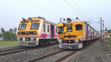 Amazing perfect timing parallel train crossing between old and new model EMU local trains