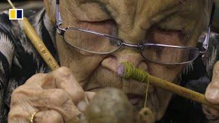 Singaporean family keeping religious effigy-art alive