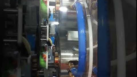 Kowey Yogurt Cups in mold labeling Side Entry Robot