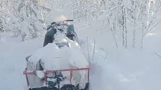 Пробиваем путики на снегоходе Буран