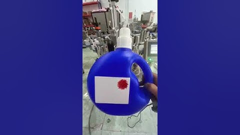 Máy dán nhãn 2 mặt chai nước giặt, nước xả, nước rửa chén. Máy thanh lý giá rẻ LH 0916311442