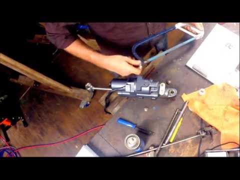 Installing a power trim tilt unit in an outboard motor