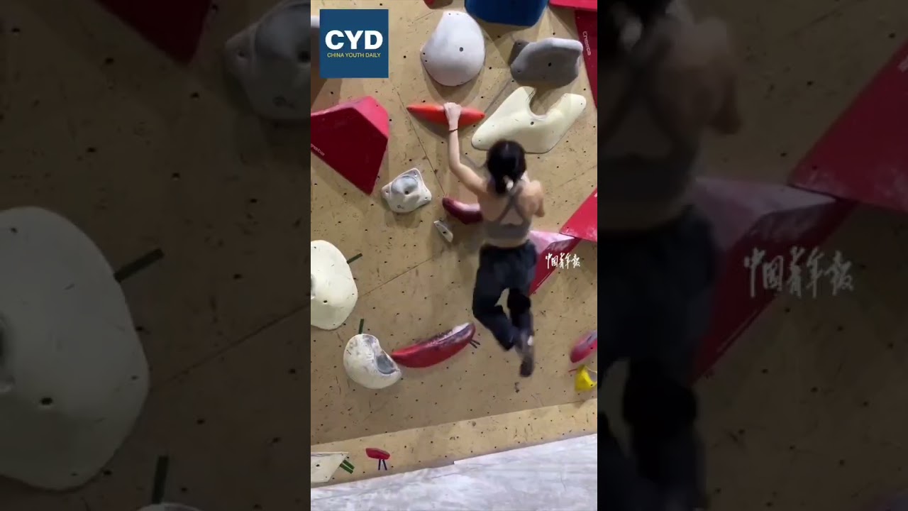 Shanghai girl embraces rock climbing.