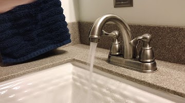 Installing new NEOPERL faucet aerator.