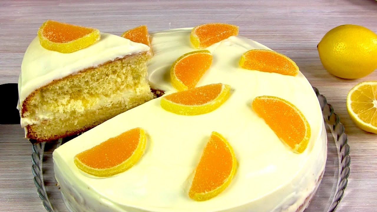Лимонный торт в суффиксе полного. Лимонный торт. Тортик с лимонным кремом. Лимонный бисквитный торт. Лимонный бисквит для торта.
