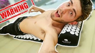 SLEEPING ON A BED OF NAILS [WARNING]