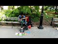 Adjua playing the Blues as Sweet as I've Ever heard in Washington Square Park NYC