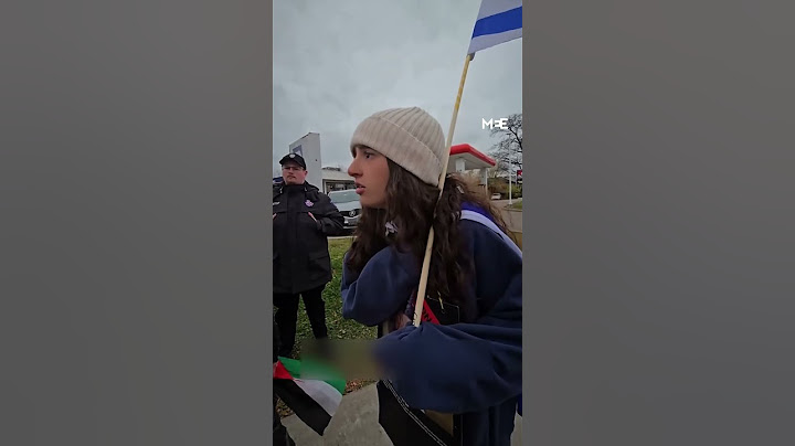 Pro-Palestine protester argues with Israeli teen protester