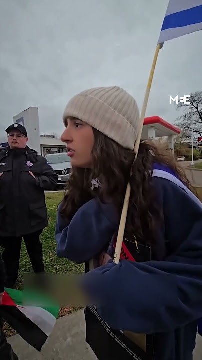 Pro-Palestine protester argues with Israeli teen protester